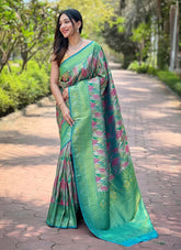 Soft sea green hue with rich contrast border saree